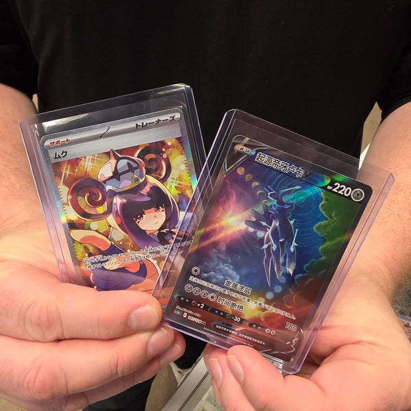 A collector showing off a big pull at Cards2Go